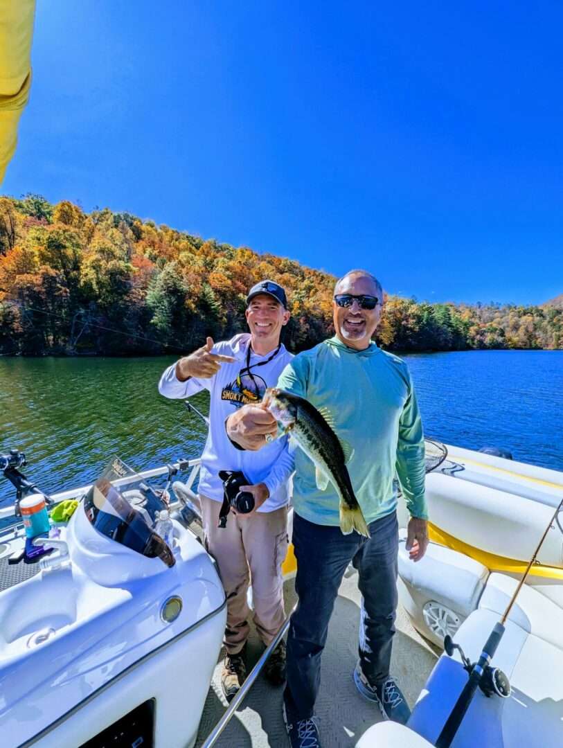 Man catching fish on a guided sunset charter boat fishing tour