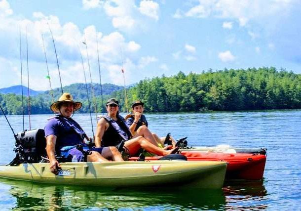 Guests catching fish on a guided kayak fishing tour